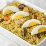 How Is Bringhe, or Savory Rice, Typically Made in the Philippines?