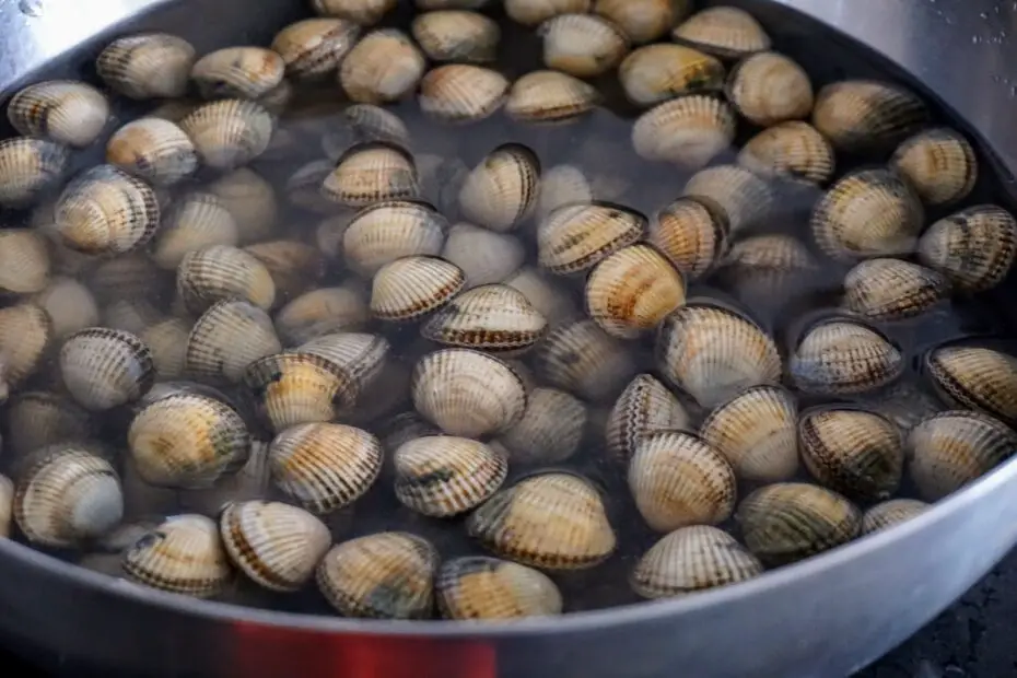 How Are Tulya (Clams) Typically Cooked in Philippine Cuisine?