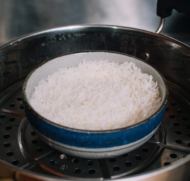 How Is Steaming Used as a Rice Cooking Technique in Filipino Cuisine?